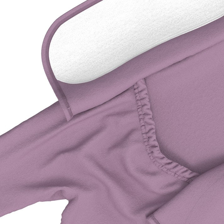 Close-up of a fitted sheet with a pillow on a white background