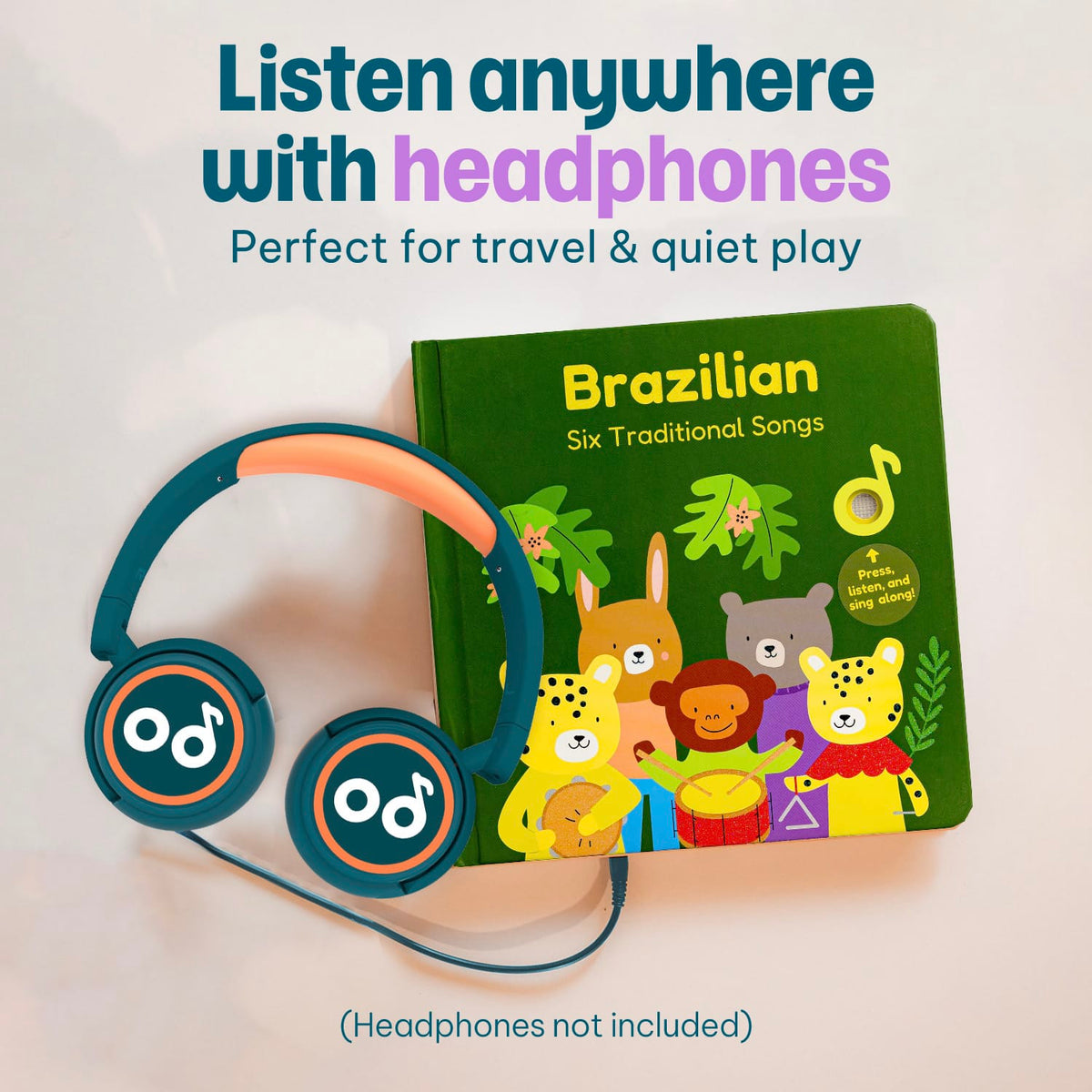 
A children's hardcover book titled 'Brazilian Six Traditional Songs' with colorful animal illustrations on a green cover, shown next to teal and orange over-ear headphones. Large text at the top reads 'Listen anywhere with headphones' and smaller text says 'Perfect for travel & quiet play.