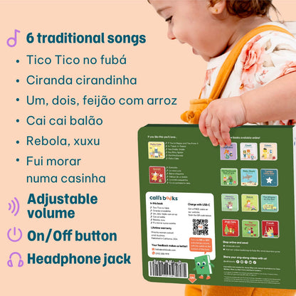 
A baby girl in a floral dress and orange bib holds a Call's Books 'Tico Tico' traditional song music toy. The image features promotional text in Portuguese highlighting key features like adjustable volume, on/off button, and headphone jack, alongside a list of six traditional songs.