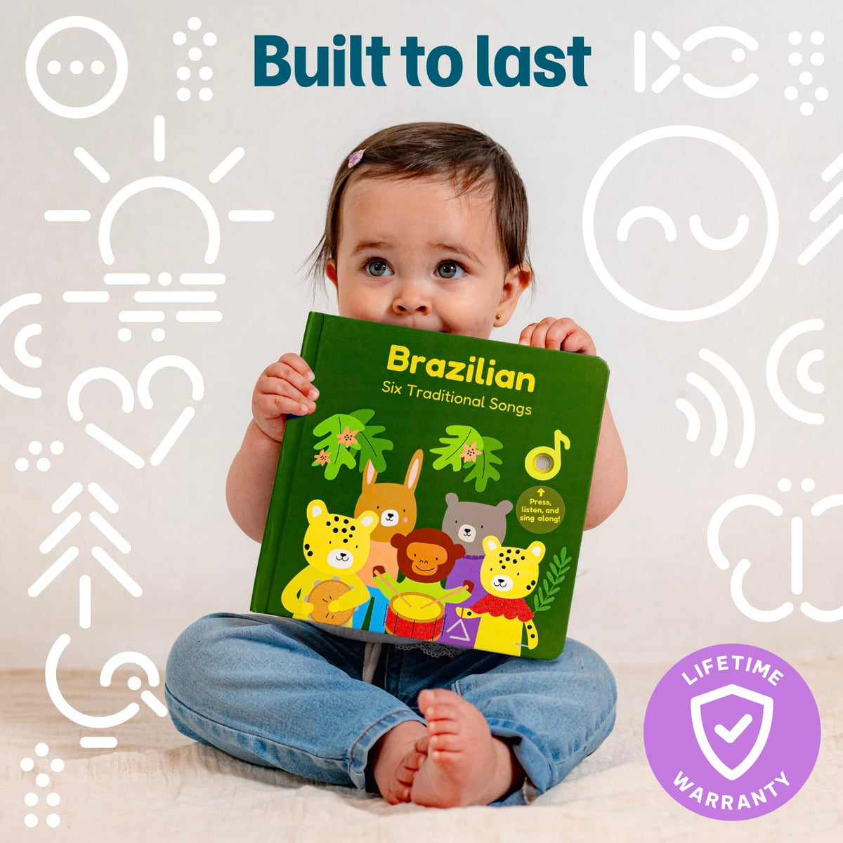 
A baby sitting on a light floor holding a green children's book titled 'Brazilian Six Traditional Songs' with colorful animal illustrations. The background is white with decorative icons and text reading 'Built to last' and a purple 'Lifetime Warranty' badge.