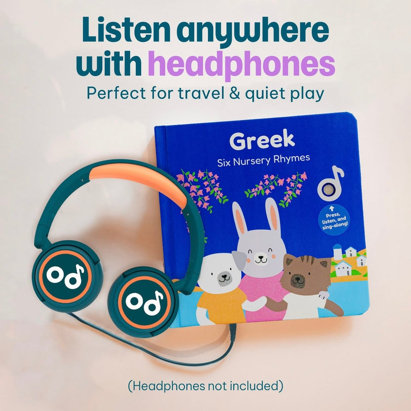 
A pair of teal kids' headphones connected to a blue "Greek Six Nursery Rhymes" musical book.