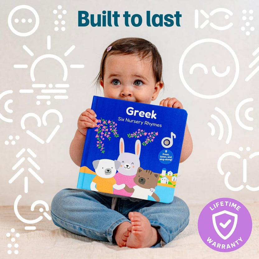 
A baby sitting on a light floor holds a blue board book titled 'Greek Six Nursery Rhymes'. The background is white with minimalist white line icons and text overlays reading 'Built to last' and a purple 'Lifetime Warranty' badge.