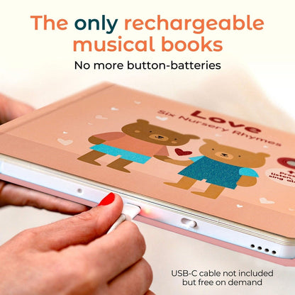 
Rechargeable musical book with USB-C cable attachment, featuring cartoon bears on a pink background.