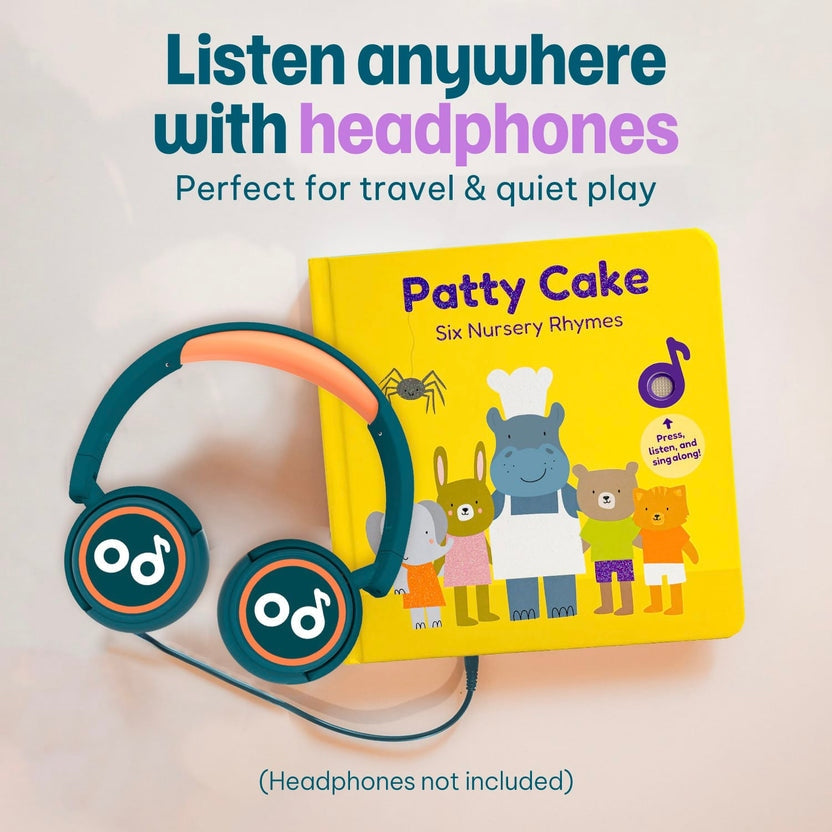 
A pair of teal kids' headphones connected to a yellow "Patty Cake" musical book.